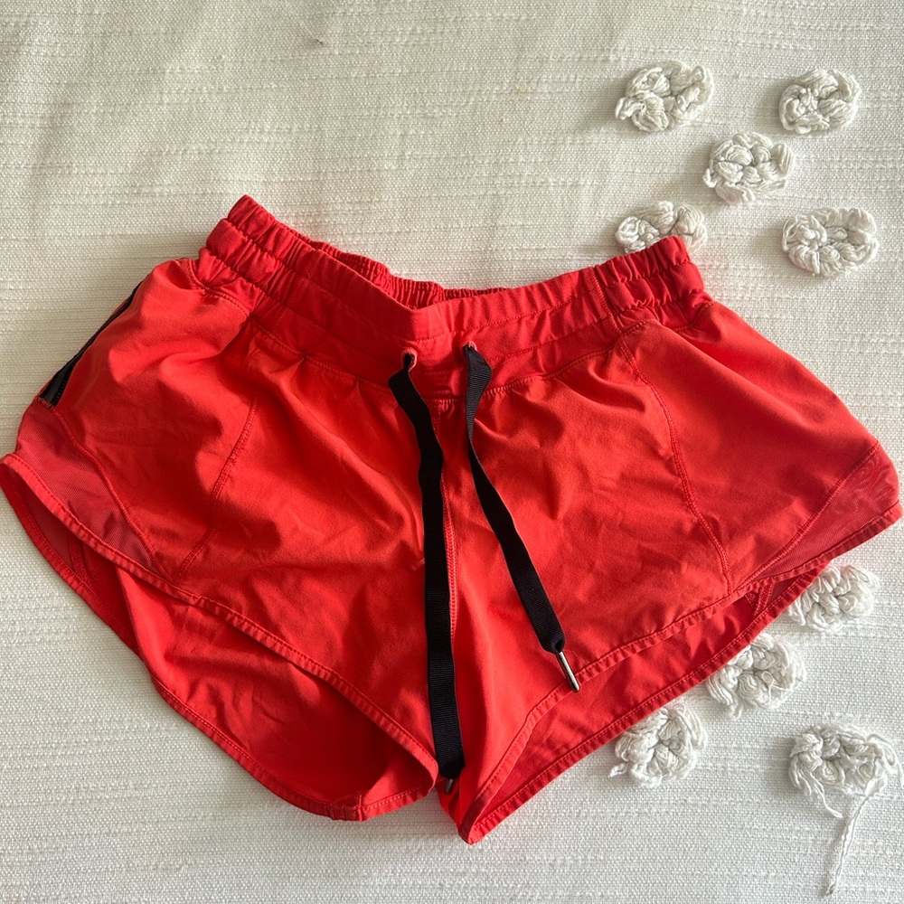 Lululemon 2.5 inch Orange Hotty Hot Shorts